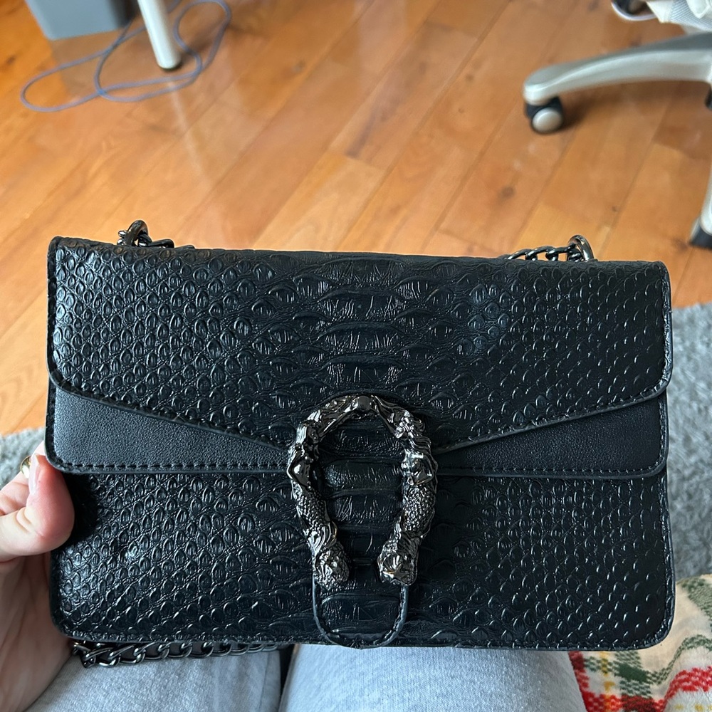 Black crossbody bag with silver hardware